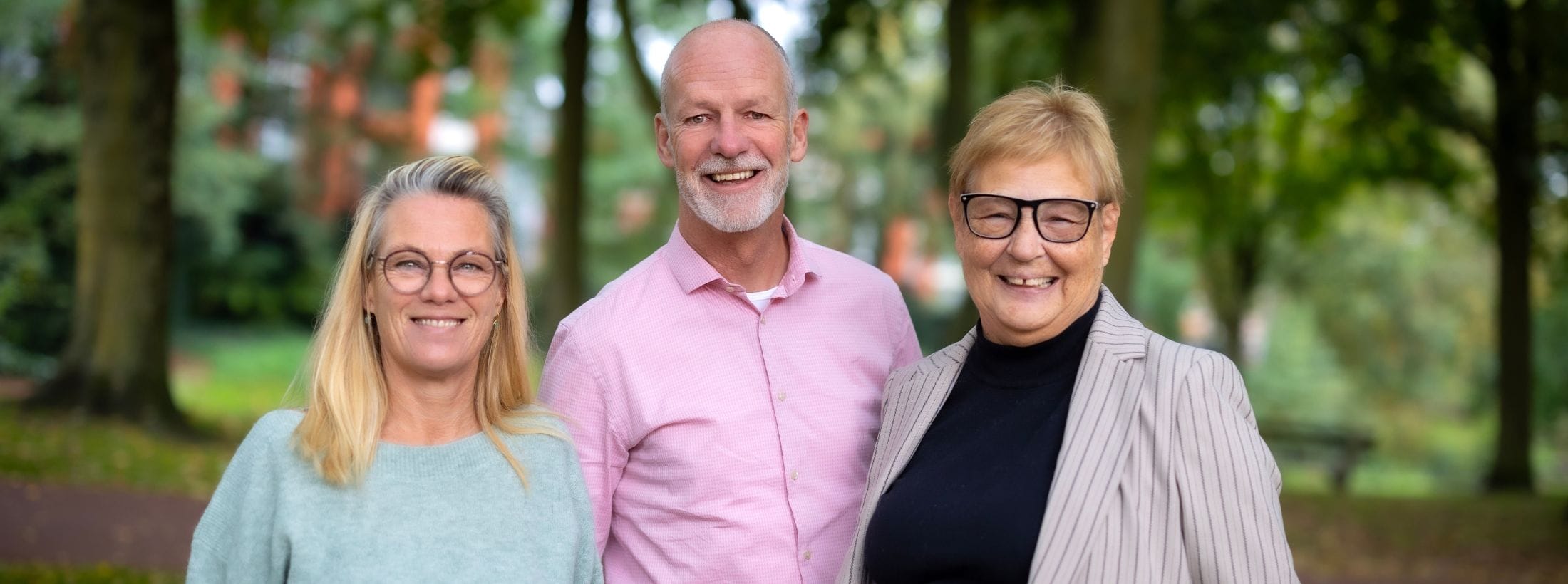 Portretfoto van geestelijk verzorgers Sylvia van de Vossenberg, Leon Pouwels en Ans Schellekens.